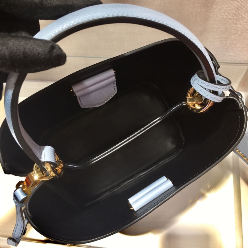 Pra*a top handle bags